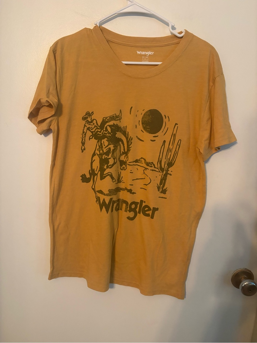 Wrangler women’s size small Mustard Graphic Tee